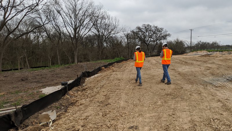 Certified professional in erosion and sediment control developing a plan to ensure soil safety.